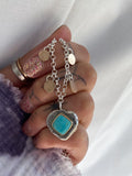 sterling silver and 14k yellow gold kingman turquoise pendant kaivi jewelry woman wearing necklace