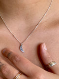 sterling silver crescent moon evil eye pendant kaivi jewelry woman wearing necklace